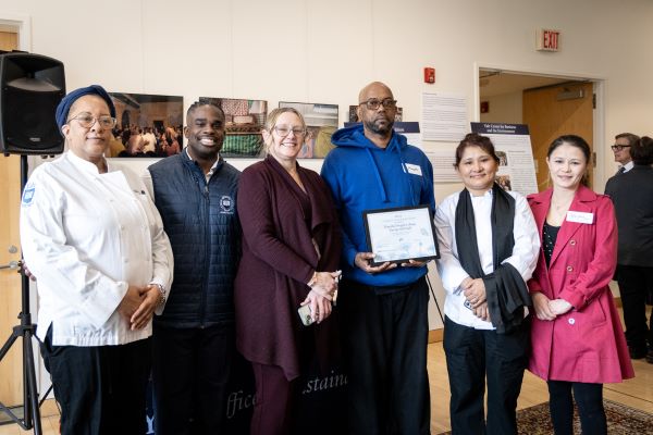 Pictured from left Wanda Underwood, Jovan Bloise, Kristin Elliott, China Mayes, Tenzin Choekyi, and Bayan Abisheva Timothy Dwight dining hall staff stand in a row with their sustainability award.